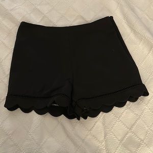 Black scallop shorts